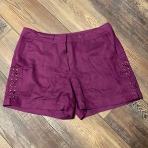 Purple 5” side detail shorts.
